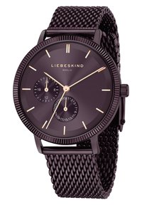 Zwarte polshorloge met een gaasarmband. Ronde wijzerplaat met gouden wijzers en kleine subwijzerplaten. Getextureerde bezel en minimalistisch ontwerp.