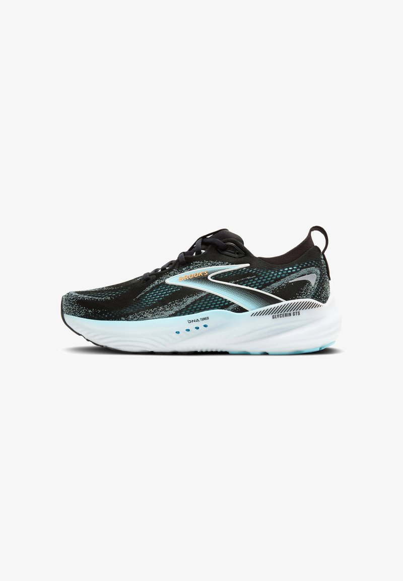 Melna skriešanas apavi ar ziliem akcentiem, teksturēts tīkla augšdaļa, mīkstināta balta zole un atstarojoši elementi. Iekļautas auklas un logo.