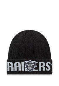 Mustat neulottu pipo, jossa on käännetty reunus, johon on kirjattu "RAIDERS" harmaalla. Edessä on joukkueen logo-patch. Sujuva pinta.