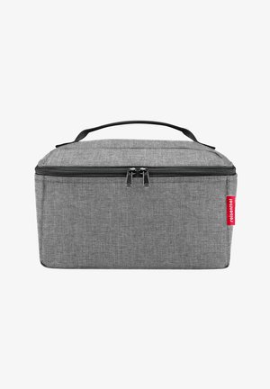Gray fabric lunch bag with a rectangular shape, zip closure, top handle, and red logo accent. Textured surface with a modern design.