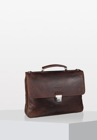 Brown leather briefcase with a smooth texture, a silver clasp, and a top handle. Features a flap closure and embossed logo on the front.