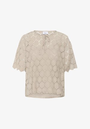 Beige gehaakte blouse met bloemendaagse kantpatroon, korte mouwen, ronde halslijn en strikdetail aan de voorkant. Zachte, gestructureerde stof.