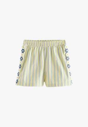 Halványsárga rövidnadrág függőleges tengerészkék csíkokkal, rugalmas derékrésszel, és kék-fehér hímzett virágdísszel az oldalsó varrások mentén.