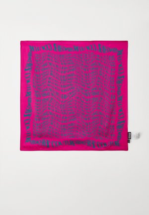 Fuchsia silk scarf featuring wavy text designs in dark teal. Edges are neatly finished, with a small tag visible at the bottom corner.