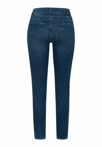 Jeans de mezclilla azul oscuro con un corte ajustado, que cuentan con cinco bolsillos, una cintura de altura media y una textura suave. La vista trasera muestra costuras reforzadas.