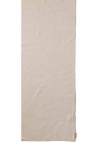 Couverture en coton beige clair avec une texture douce et une surface lisse, présentant des bords nets et un design simple et subtil.