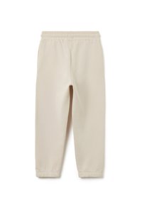 Beige joggingbroek van zachte stof, met een elastische tailleband, zijzakken en elastische boorden bij de enkels.