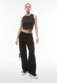 Freddy MELANIE CARGO - Housut - black direct dyed