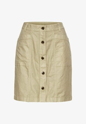 Jupe en lin beige clair avec une fermeture à boutons à l'avant, deux poches latérales et des coutures pour ajouter de la texture.