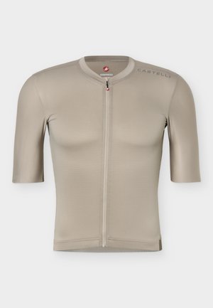 Beige cykeltrøje med korte ærmer, fuld lynlås foran, rund krave og "Castelli"-logo på skulderen.