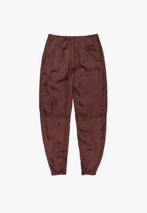 Rudi satino kelnės su laisvu siluetu, su elastine liemene ir susiraukšlėtais rankogaliais, suteikiančiais siaurą išvaizdą. Sklandus paviršius ir subtilus blizgesys.