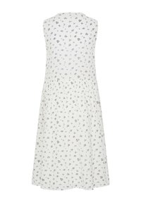 Robe blanche sans manches avec petit motif floral bleu et noir, taille froncée et jupe longueur genou vue de dos.