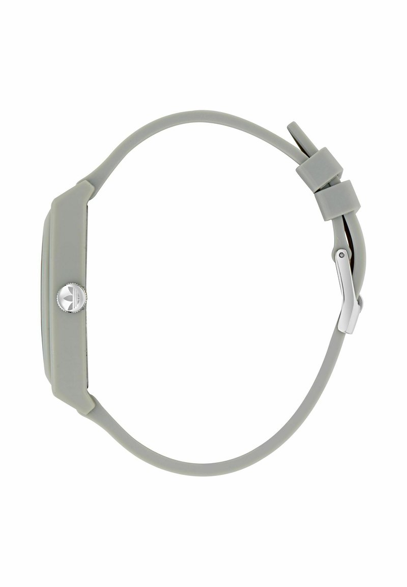 Smartwatch in silicone grigio con quadrante rettangolare e cinturino regolabile con fibbia, mostrato di lato su sfondo bianco.