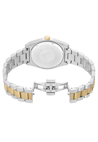 Hopeakultainen kaksivärinen kello, jossa on pyöreä kotelo, metallinen ranneke, kultainen kaulus ja solkilukko. Rannekkeen linkeissä on teksturoitu pinta.