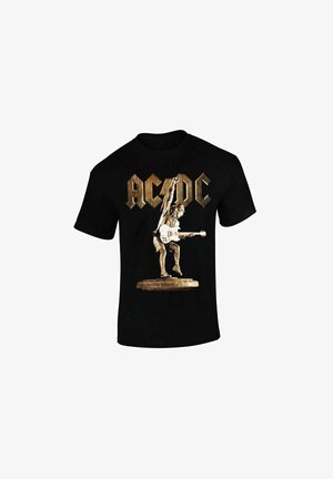 Czarna koszulka z brązowym posągiem gitarzysty z uniesioną pięścią i pogrubionym napisem "AC/DC" powyżej.