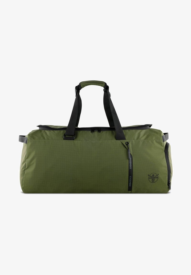 Duffle bag in olive green with a grid pattern, black straps, and a side zippered pocket. Features a logo on one side and sturdy handles.