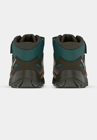 Hiking shoes with a teal upper, gray accents, and a rugged black outsole. Features padded collar and reinforced heel for support.