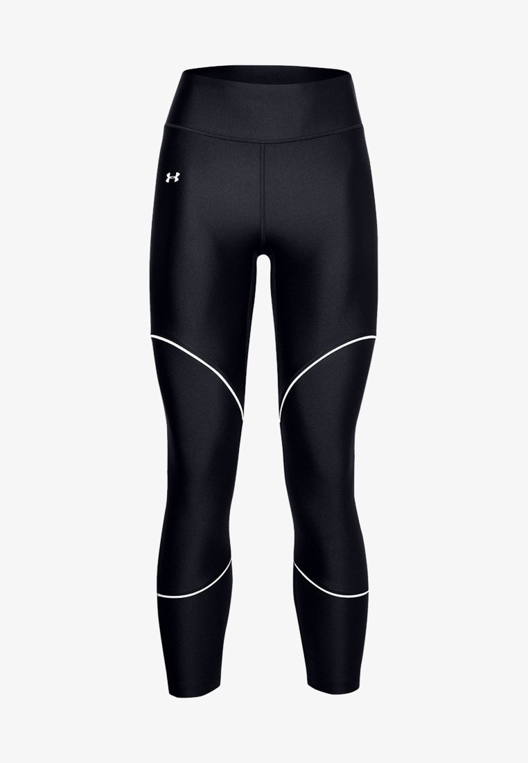 Svarta träningsleggings med hög midja, med vita accentresår och en figurnära design. Tillverkade av ett mjukt, elastiskt material.