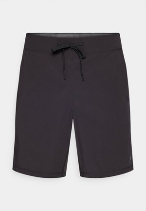 Black swim trunks with a drawstring waistband, smooth texture, knee-length design, and minimal branding on the lower left side.