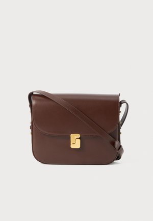 Brown leather crossbody bag with gold clasp and adjustable strap, smooth finish and rounded edges, shown against a light background.