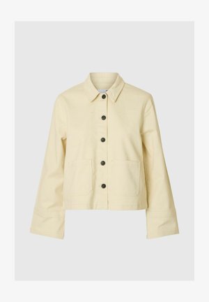 Hele kollane jakk, nööbitav disain, voltitud krae, pikkade varrukatega, kaks eesmist taskut, mustad nupud, valmistatud puuvillase sarnase materjaliga.