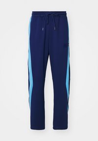 AIR - Tracksuit bottoms - blue void/university blue/white
