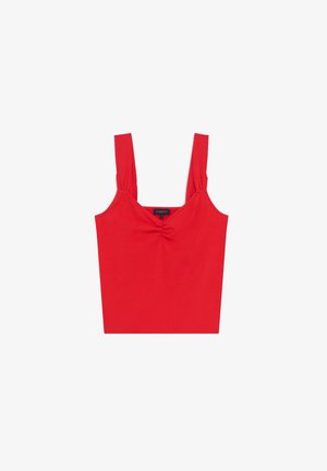 Red sleeveless top made of soft fabric featuring a gathered front, wide straps, and a fitted silhouette. Simple design with no additional patterns.