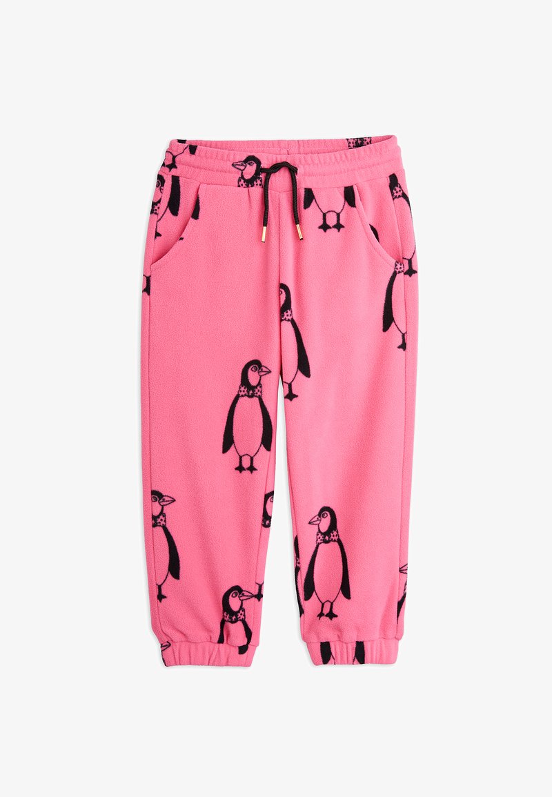 Pantaloni da jogging rosa in felpa con una stampa nera di pinguini ripetuta, dotati di vita elasticizzata, cordino e tasche laterali.