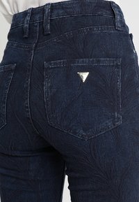 Guess Vaqueros pitillo - dark-blue denim
