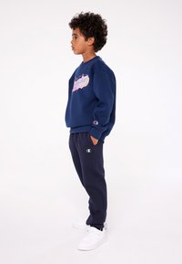 Champion - BASIC CUFF PANTS UNISEX - Treningo apatinė dalis - dark blue Miniatiūros vaizdas 1