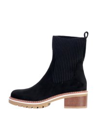 Bottine en suede noir avec tige en tissu côtelé, bout rond et talon empilé en bois brun. Comprend une semelle épaisse et rembourrée pour un confort accru.