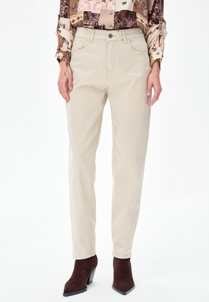 - Spodnie materiałowe