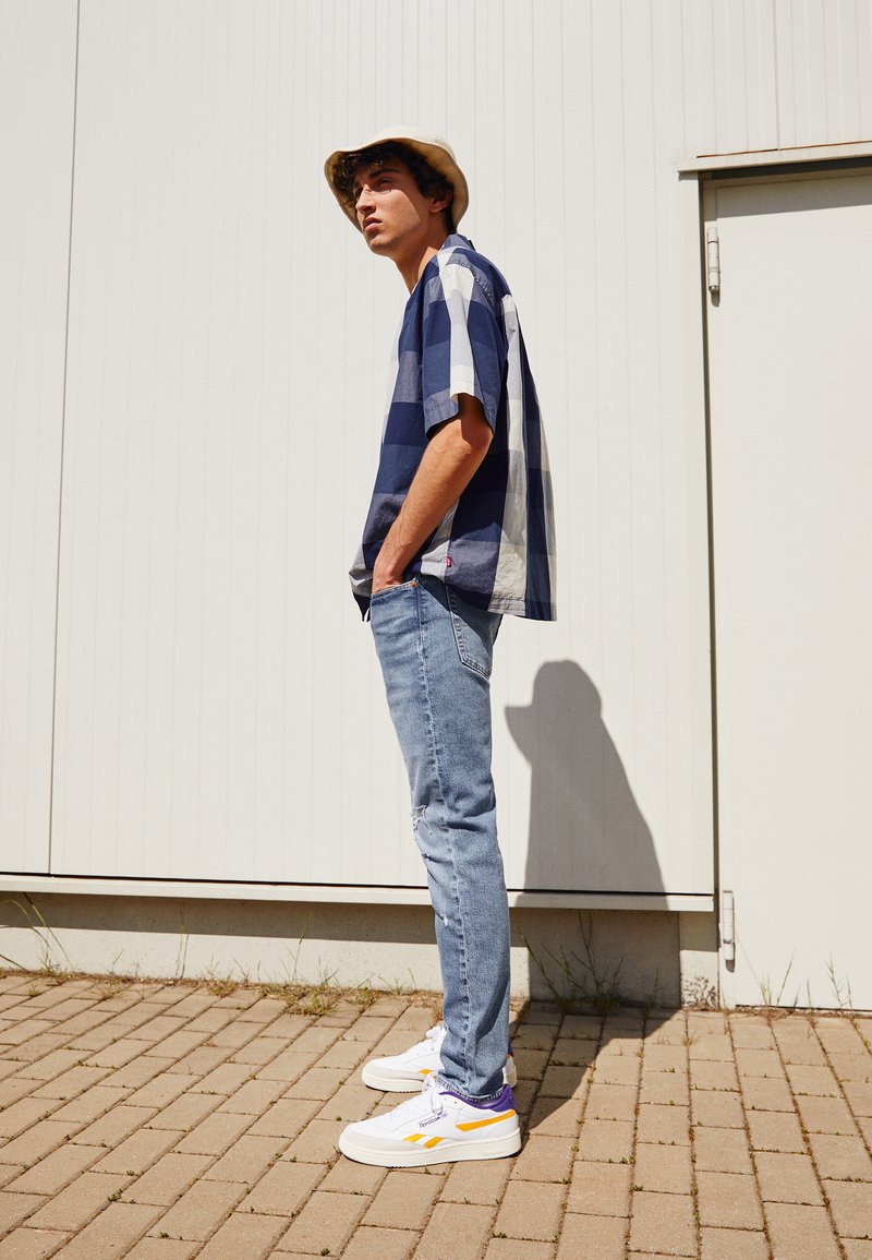 Levi's® 512™ SLIM TAPER - Calças de ganga justas - medium indigo worn in