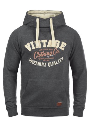 Gray hooded sweatshirt with a front pocket, cream drawstrings, and large white and orange text detailing "Vintage Clothing Co. Premium Quality."