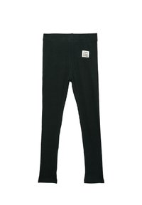 Svarta räfflade leggings med en stretchig midja och en etikett som lyder "Gör bra val." Tyget har en texturerad yta.