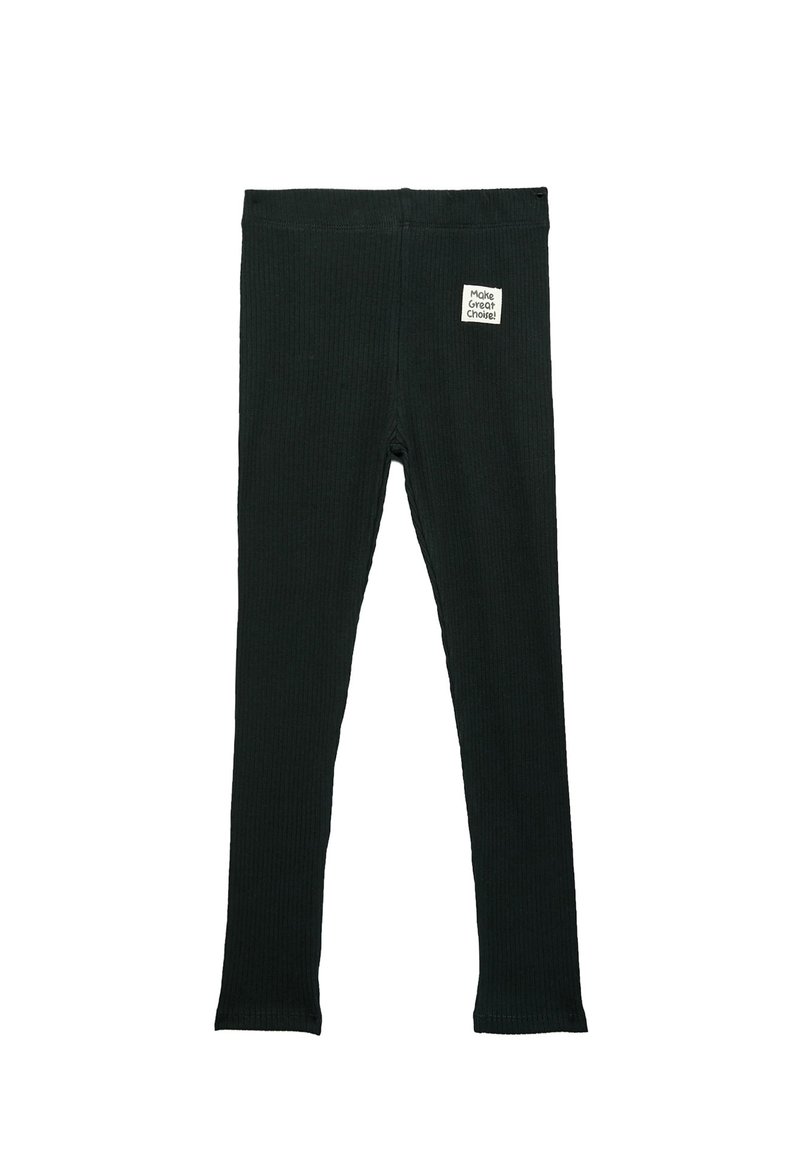 Svarta räfflade leggings med en stretchig midja och en etikett som lyder "Gör bra val." Tyget har en texturerad yta.