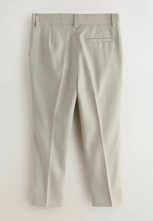 Heledat hallid püksid tekstuurse kangaga, millel on ees kortsud, üks tagatasku ja sirge säärega lõige.