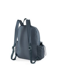 Mochila acolchada de color gris oscuro con correas de hombro ajustables, bolsillos laterales y un asa en la parte superior, mostrada desde la parte posterior sobre un fondo blanco.