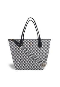 Geometric patterned tote bag in navy, cream, and gray. Features black leather handles and detachable patterned strap. Gold hardware accents.
