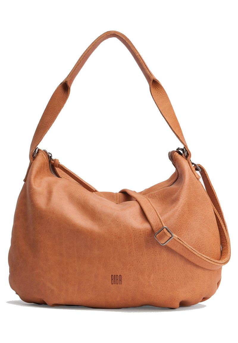 Tan leather shoulder bag with a soft, rounded shape, adjustable strap, zipper closure, and embossed logo detail.