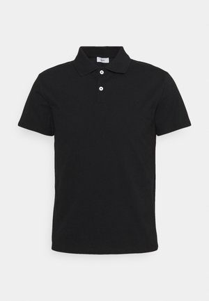 Schwarzes Poloshirt aus Baumwolle, mit Kragen, kurzen Ärmeln und drei Knöpfen am Hals. Dezent platziertes Logo auf der Brust.