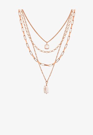 Slojevita ogrlica u roza zlatu, koja sadrži različite stilove lanaca i pravokutni privjesak s svijetlim kamenom na dnu.
