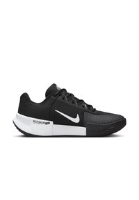 Scarpe da ginnastica nere con tomaia in rete testurizzata, logo Swoosh bianco e suola in gomma con battistrada a motivo per una migliore aderenza.