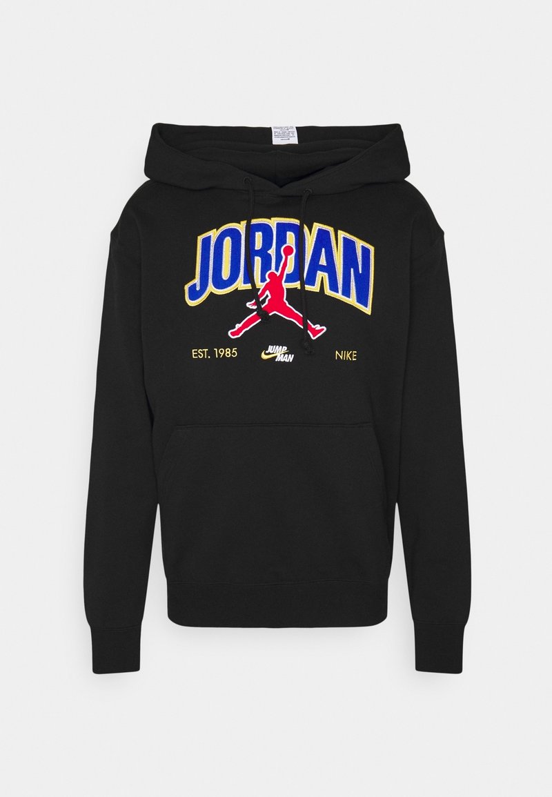 Black hoodie made of soft fabric featuring multicolored embroidered text "JORDAN" and a red Jumpman logo on the front. Includes a front pocket.