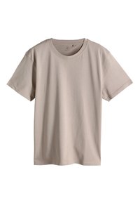 Prosty jasnobeżowy bawełniany T-shirt z krótkim rękawem i okrągłym dekoltem, pokazany na białym tle.