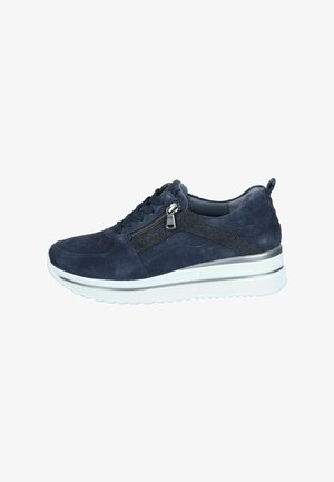 Navy suede sneaker with lace-up front, side zipper, metallic accents, and a thick white sole. Features smooth and textured material contrast.