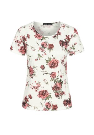 T-shirt blanc à manches courtes avec un motif floral rose, encolure dégagée et en coton doux. Le design comprend différentes formes de fleurs et de tiges.