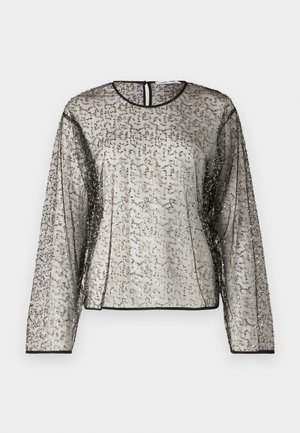 Haut transparent à manches longues avec un embellissement texturé argent et noir, col rond et ouverture en clé à l'arrière. Des finitions noires bordent les manches.