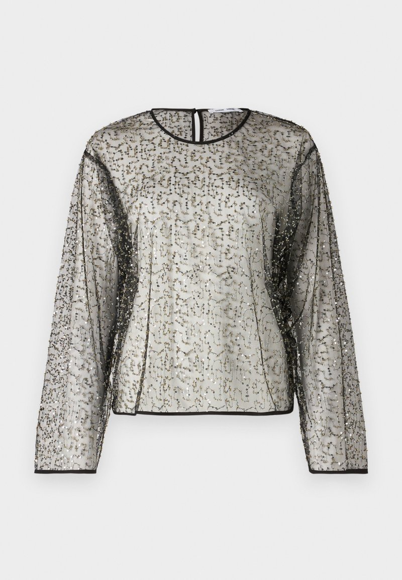 Sheer, long-sleeve top with a textured silver and black embellishment, round neckline, and back keyhole opening. Black trim edges the sleeves.