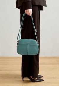 Valgt, blue